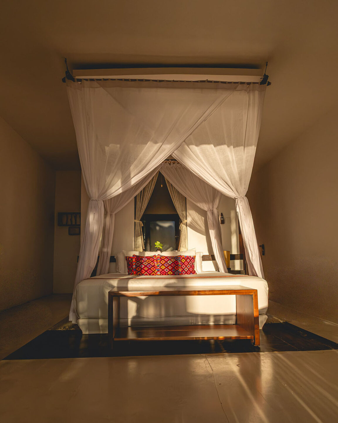 Deluxe room at The Beach tulum Hotel, canopied king size bed