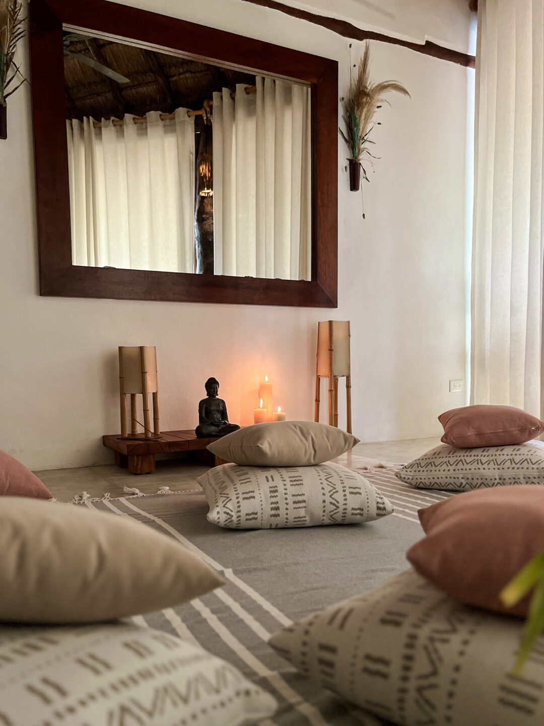 Buddha and candles in the meditation room