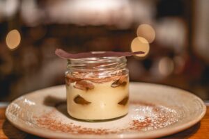 A traditional Tiramisù with Mascarpone, ladyfingers, coffee, cocoa and semi-dark chocolate